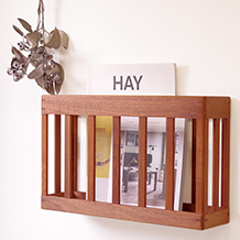 Wall magazine rack in teak