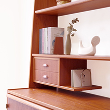 Bookshelf with postcard holder and writing board