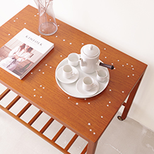 Silver star patterned trolley in teak