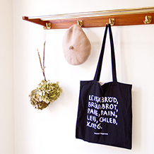 Wall mounted coat rack with shelf