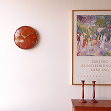 Wall clock in mahogany and brass