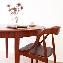 Henning Kjaernulf/Round table with 2ex. in teak