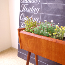 Flower planter in teak