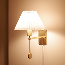 Le Klint / 2-way wall lamp in brass