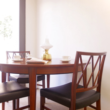 Omann Jun / Round dining table in rosewood Model55