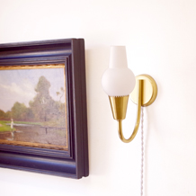 Bracket in glass and blass