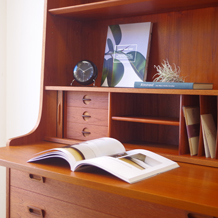Roll front bookcase with writing board with key