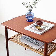 Coffee table in teak & rattan