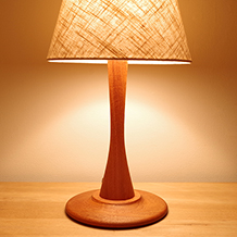 Table lamp in solid teak