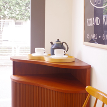 Corner cabinet with tambour doors